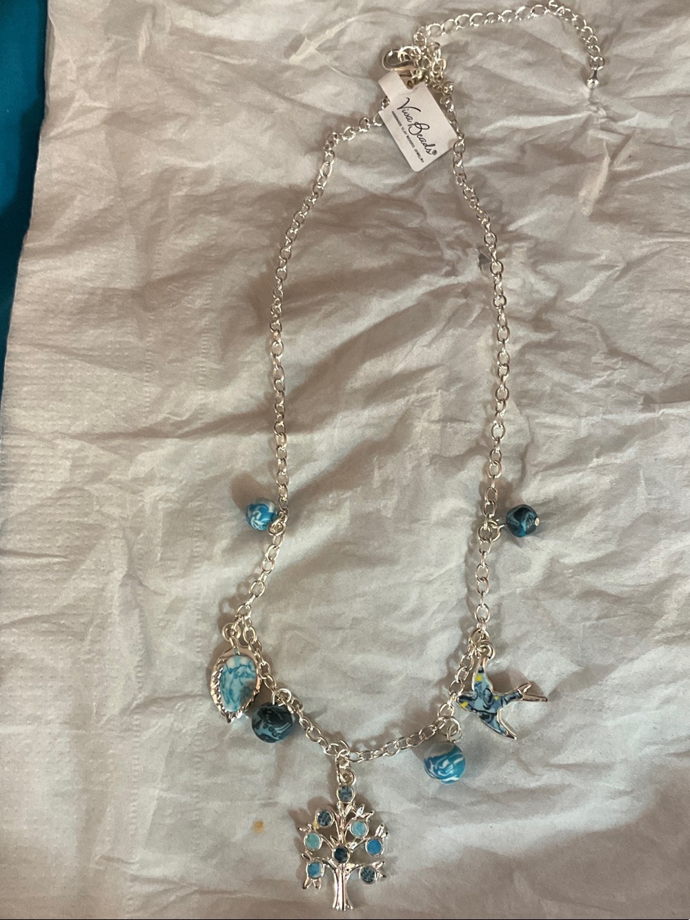VIVA BEADS Silver Tree of life with blue accents..Blue Brook
Hand made beads…